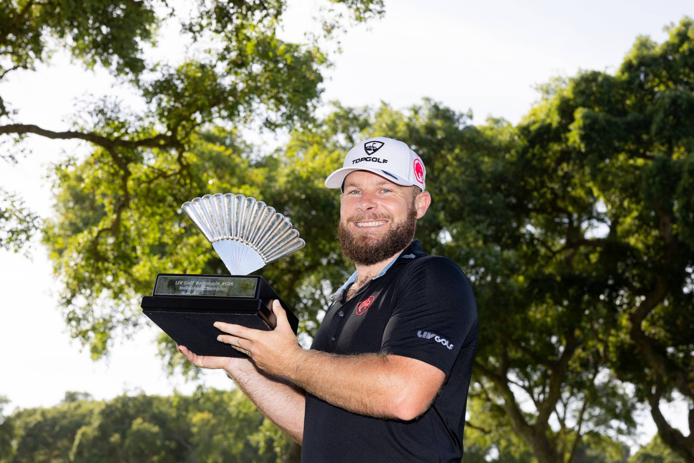 First place individual champion, Tyrrell Hatton of Legion XIII poses for a photo with his trophy following the final round of LIV Golf Andalucía at Real Club Valderrama