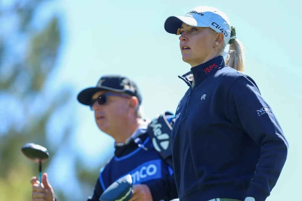 Charley Hull with her Caddie