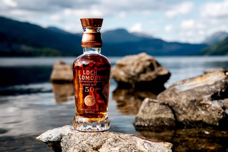 Loch Lomond Whiskey Bottle on Stones by Loch