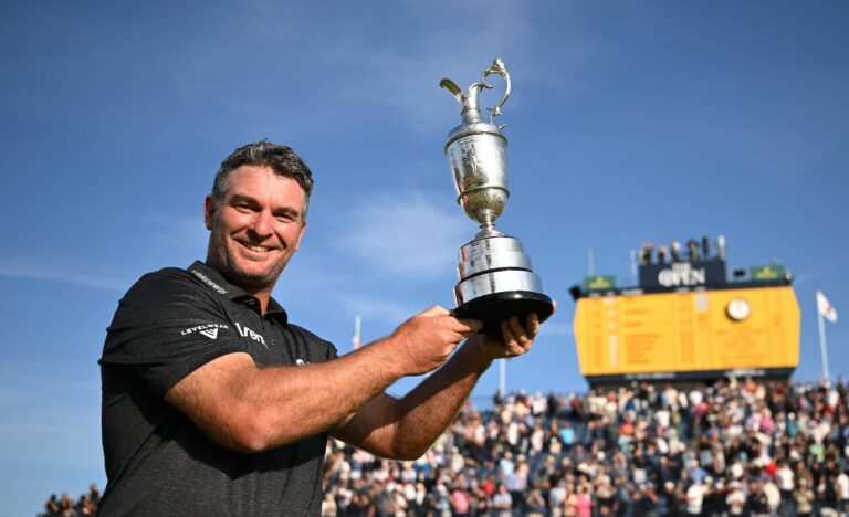 Ryan Fox of New Zealand poses with the Claret Jug following victory during Day Four of the The 154th Open Championship at Royal Birkdale