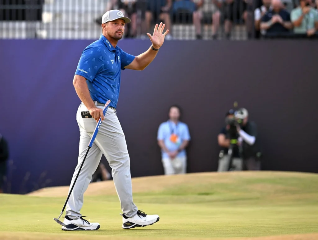 Bryson DeChambeau of the United States acknowledges the crowd following a birdie on the 18th green during Day Two of the The 154th Open Championship at Royal Birkdale