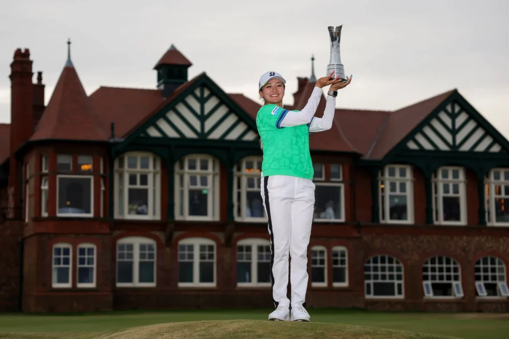 Shino Kuwaki of Japan poses with the trophy following victory of the AIG Women's Open following the Final Round of the AIG Women's Open 2026