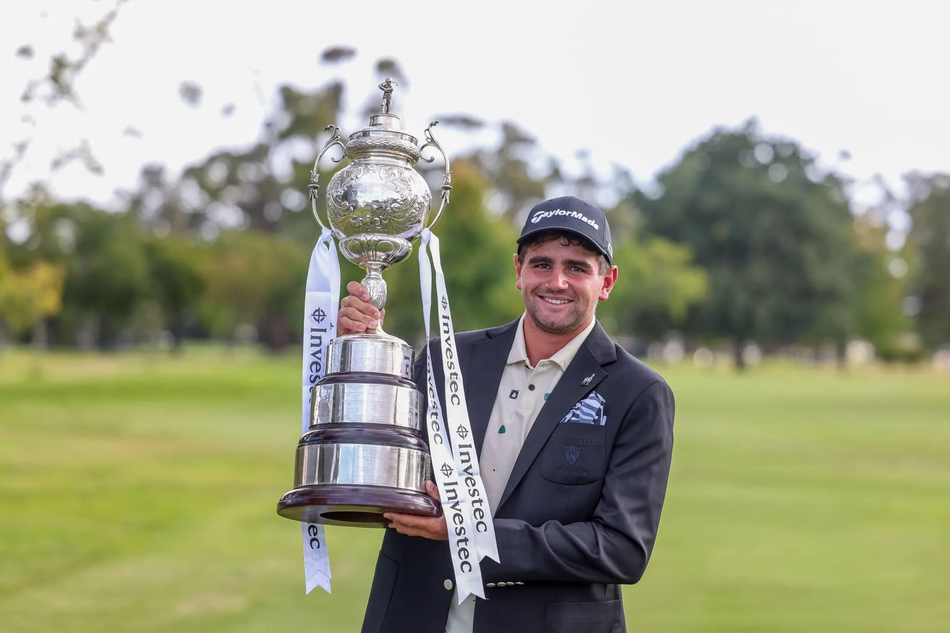 Casey Jarvis with Investec South African Open trophy