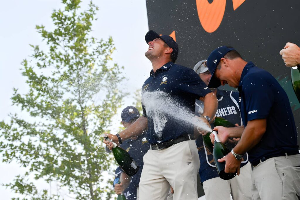 Team Champions, Captain Bryson DeChambeau of Crushers GC, Anirban Lahiri of Crushers GC, Charles Howell III of Crushers GC and Paul Casey of Crushers GC celebrate during the trophy ceremony after the final round of LIV Golf Bedminster at Trump National Golf Club