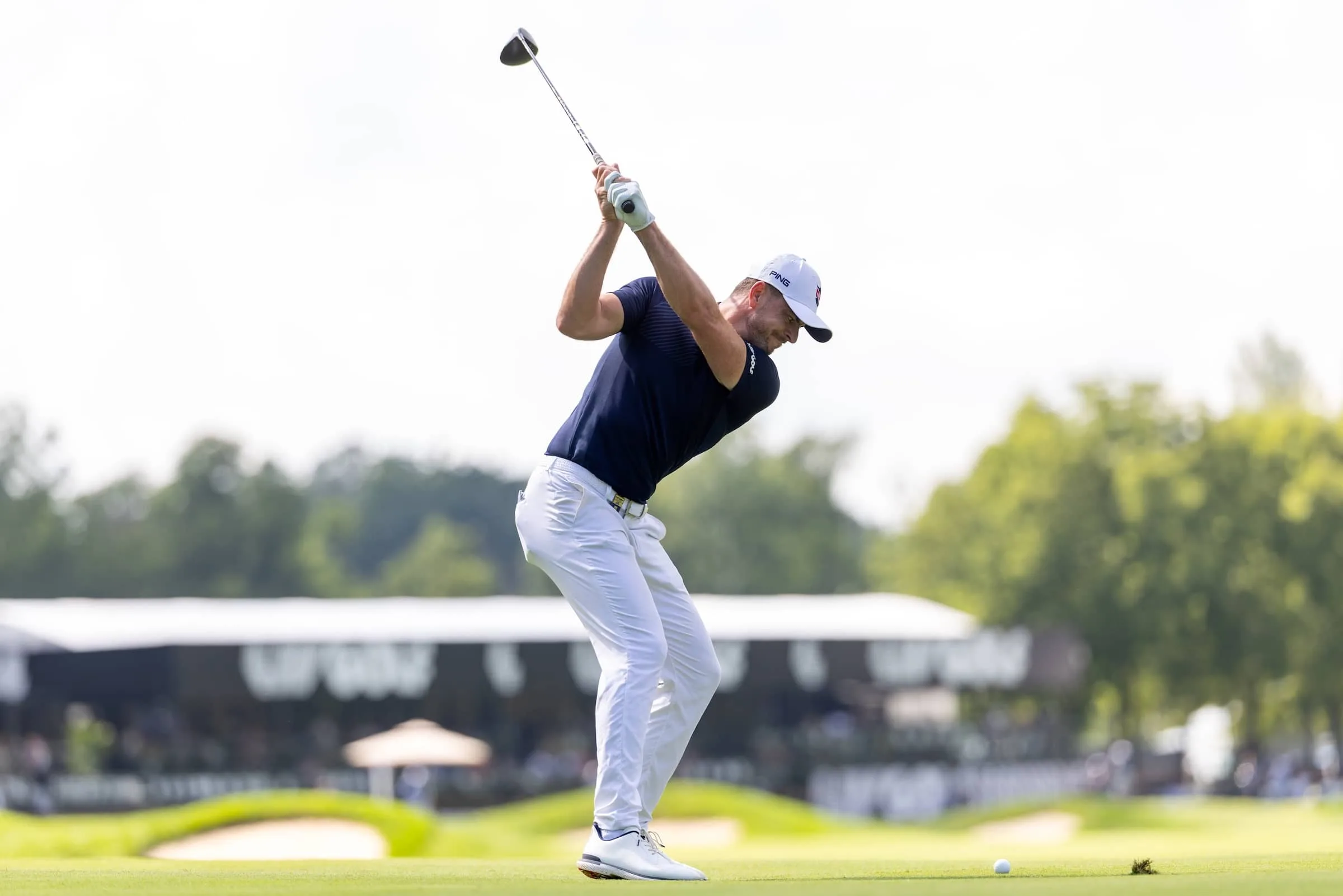 Laurie Canter of Majesticks Golf Club hits his shot on the 18th hole during the first round of LIV Golf Indianapolis at The Club at Chatham Hills