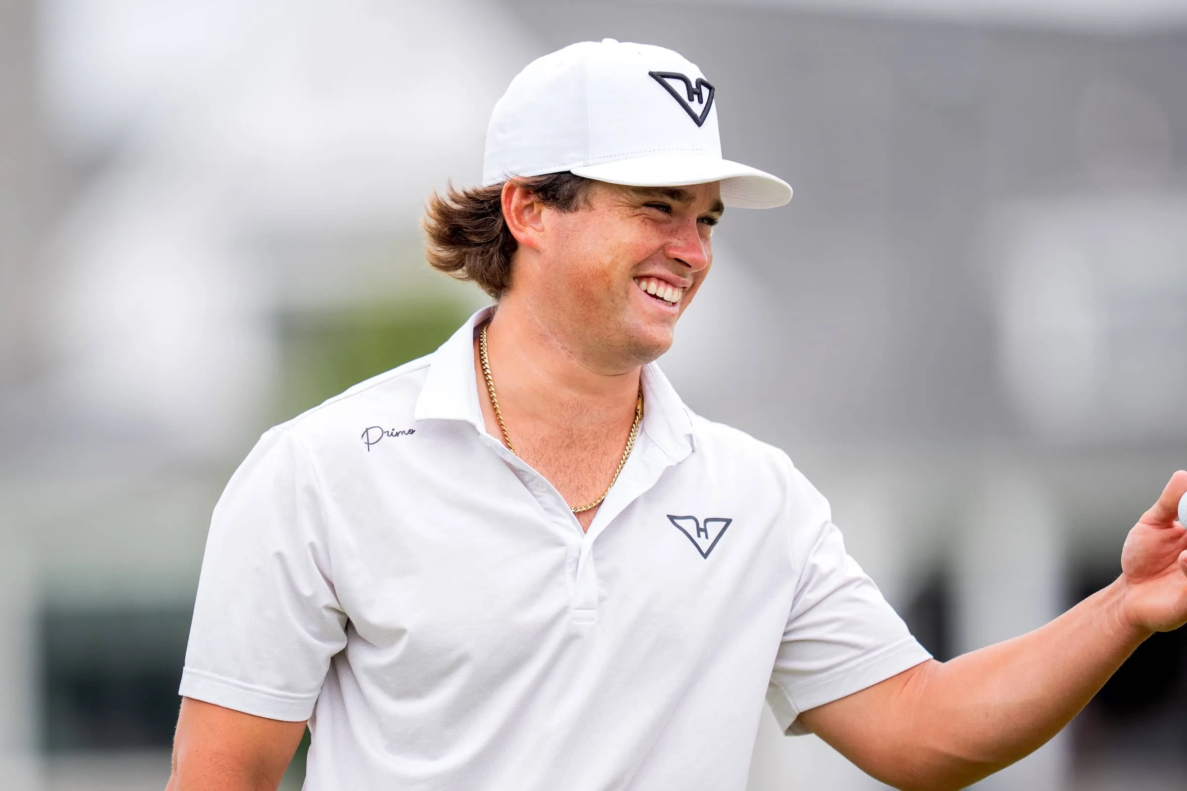 Michael La Sasso of Hyflyers GC reacts after his putt on the second green during the third round of LIV Golf Indianapolis at The Club at Chatham Hills