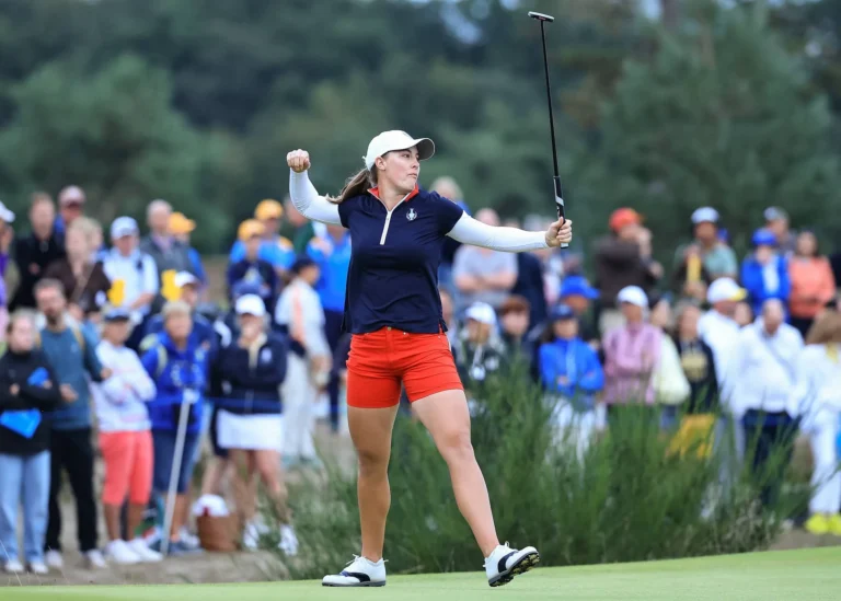 Jennifer Kupcho of The United States team holes a match winning birdie putt on the 18th green