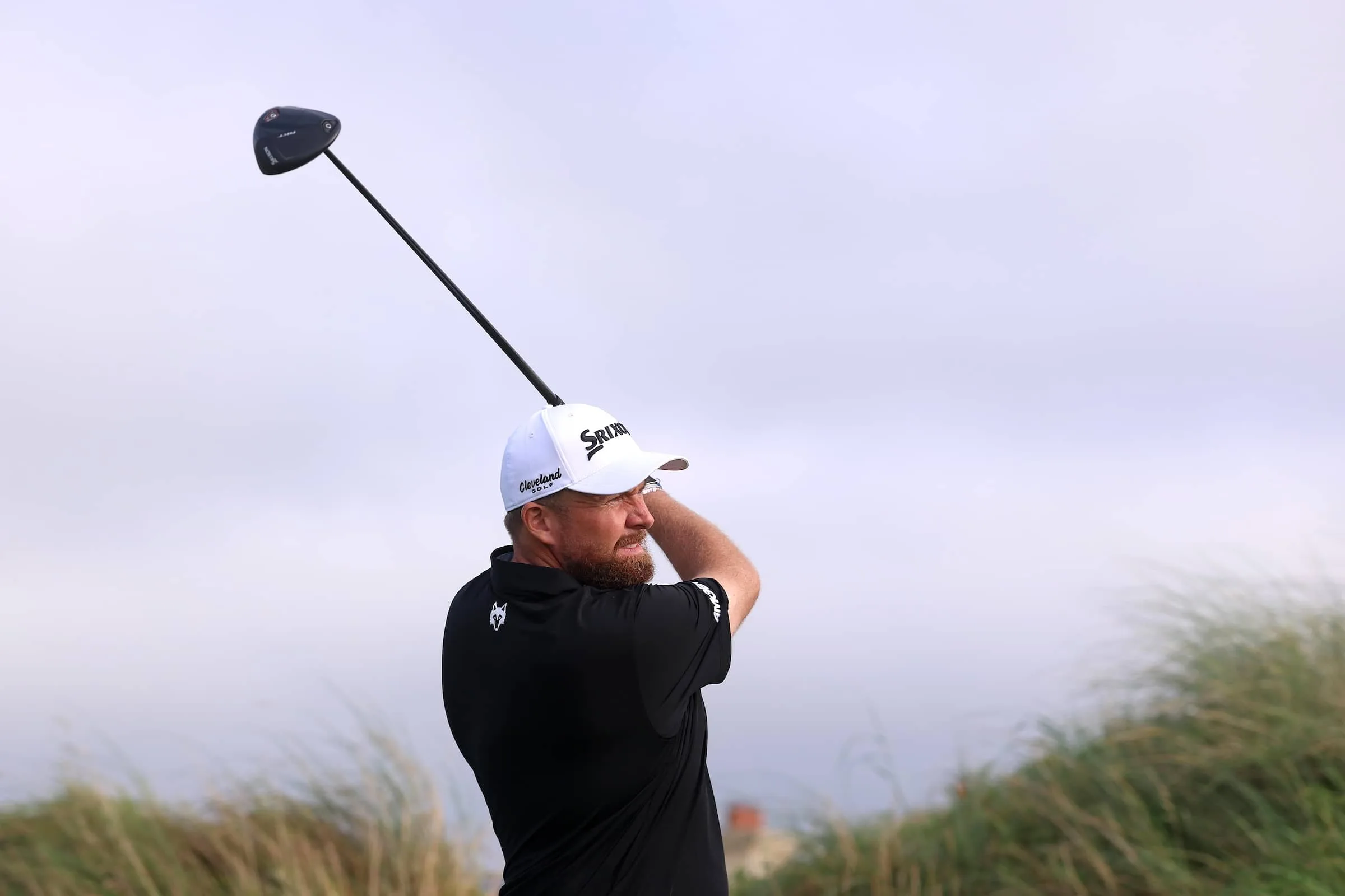 Shane Lowry watches his tee shot with a Srixon driver