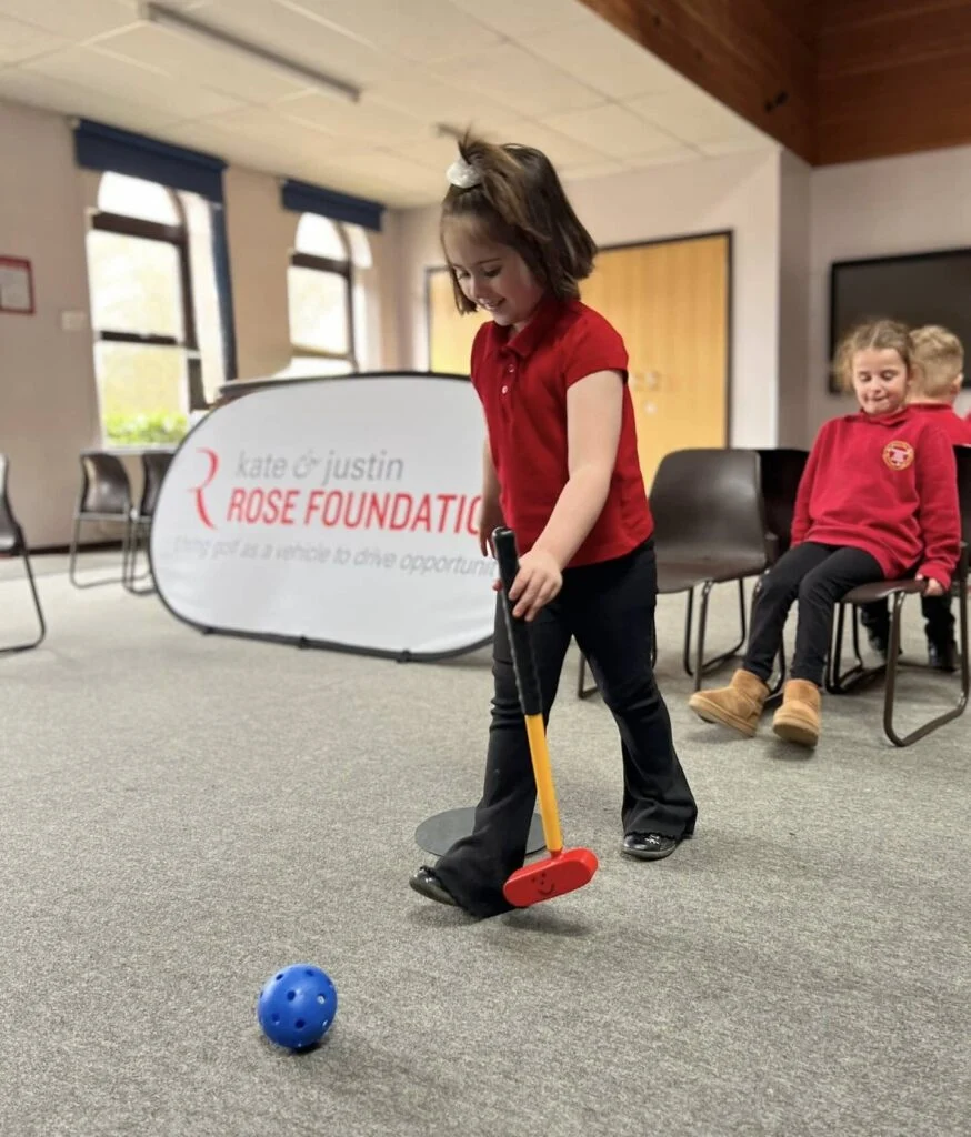 Young children with plastic golf clubs for Jolf Golf